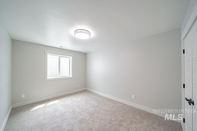 665 Emma Ct, Idaho Falls, ID 83404 - unfurnished bedroom with carpet and baseboards