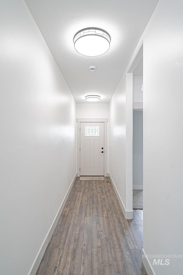 665 Emma Ct, Idaho Falls, ID 83404 - hallway with wood finished floors and baseboards