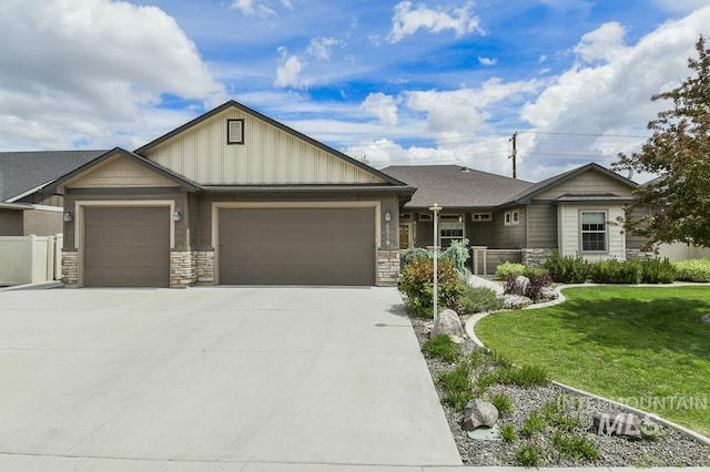 4519 Middlesboro Way, Caldwell, ID 83607 - view of front of property featuring an attached garage, stone siding, concrete driveway, and board and batten siding