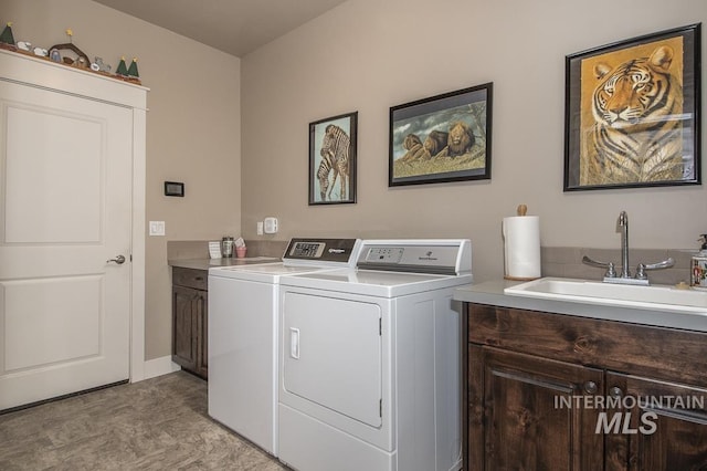 4519 Middlesboro Way, Caldwell, ID 83607 - laundry area featuring cabinet space and washing machine and dryer