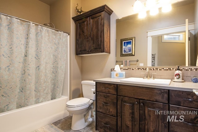 4519 Middlesboro Way, Caldwell, ID 83607 - bathroom featuring toilet, tasteful backsplash, shower / bath combination with curtain, vanity, and tile patterned flooring