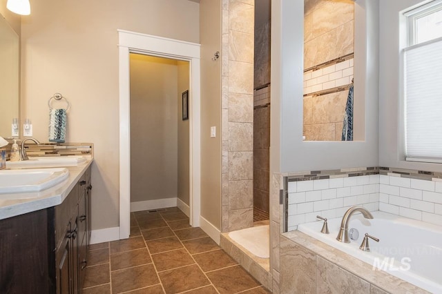 4519 Middlesboro Way, Caldwell, ID 83607 - bathroom featuring a bath, a tile shower, and double vanity