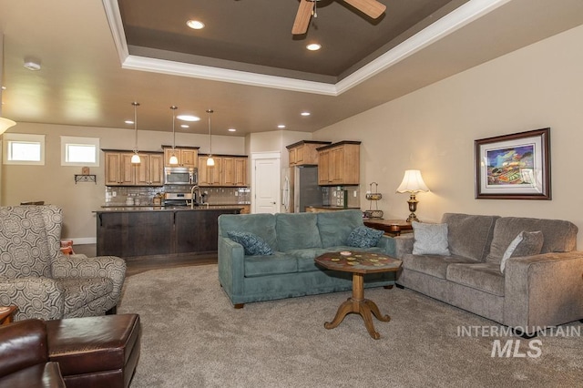 4519 Middlesboro Way, Caldwell, ID 83607 - living room with ornamental molding, a raised ceiling, ceiling fan, and recessed lighting