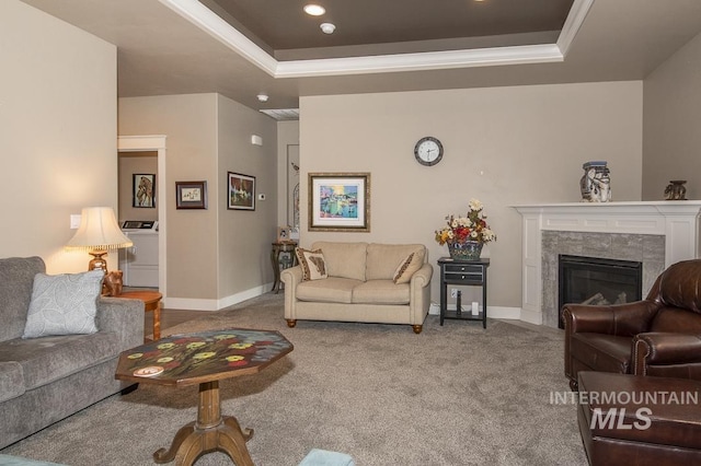 4519 Middlesboro Way, Caldwell, ID 83607 - carpeted living room featuring washer / dryer, a raised ceiling, baseboards, crown molding, and recessed lighting