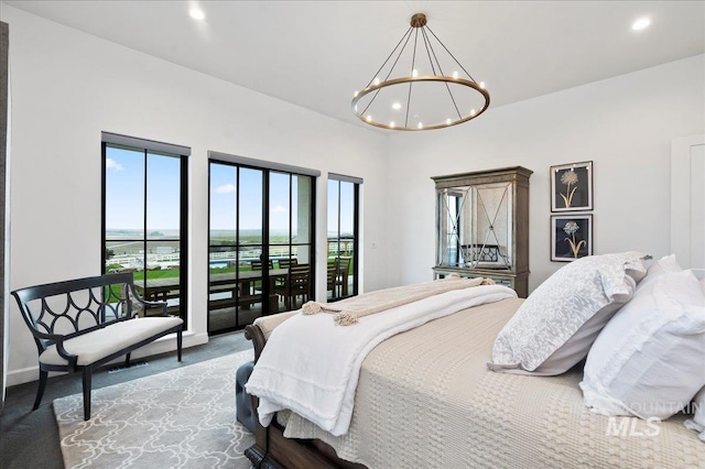 bedroom with access to outside, baseboards, recessed lighting, and an inviting chandelier