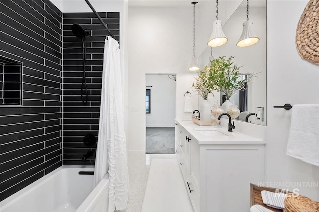 full bathroom with a high ceiling, a sink, baseboards, double vanity, and shower / bathtub combination with curtain