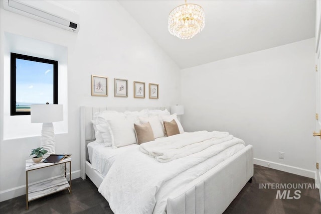 bedroom featuring baseboards, a chandelier, vaulted ceiling, and an AC wall unit