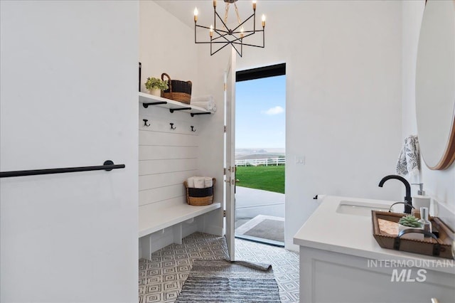 mudroom featuring a sink