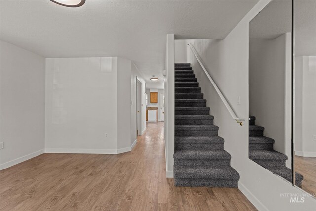 1420 S Denver, Boise, ID 83706 - stairway with wood finished floors and baseboards