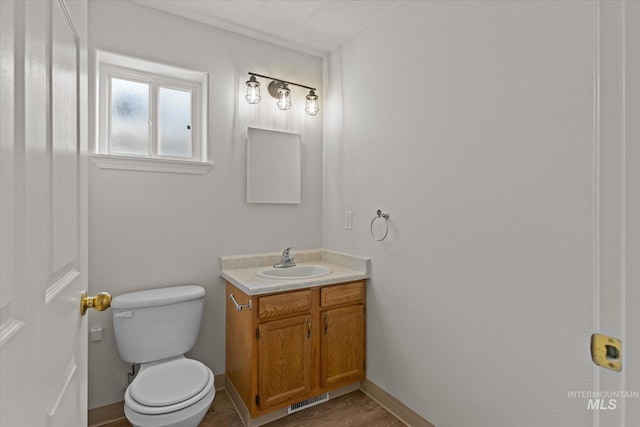1420 S Denver, Boise, ID 83706 - bathroom featuring vanity, toilet, and wood finished floors