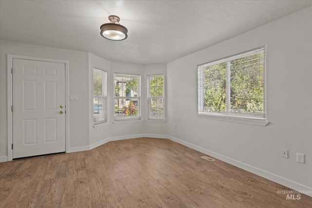 1420 S Denver, Boise, ID 83706 - foyer featuring baseboards and wood finished floors
