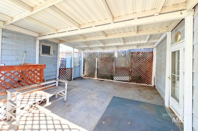 view of patio featuring a carport