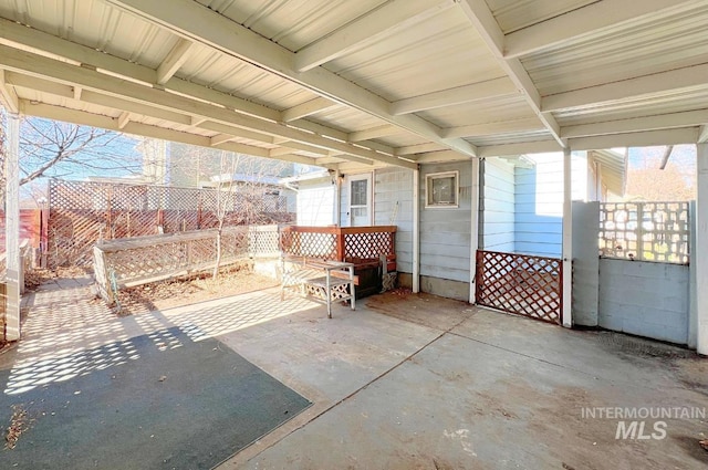 view of patio / terrace featuring fence