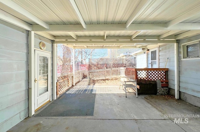 view of patio featuring fence