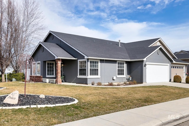 ranch-style house with a garage, concrete driveway, roof with shingles, and a front yard