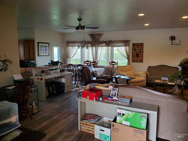 1441 Marie Dr, Gooding, ID 83330 - living room with a ceiling fan, dark wood-style floors, and recessed lighting