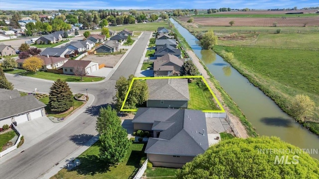 1441 Marie Dr, Gooding, ID 83330 - aerial view of residential area with property boundaries highlighted and a nearby body of water
