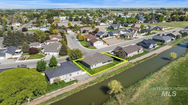 1441 Marie Dr, Gooding, ID 83330 - aerial view of residential area with property parcel outlined and a large body of water