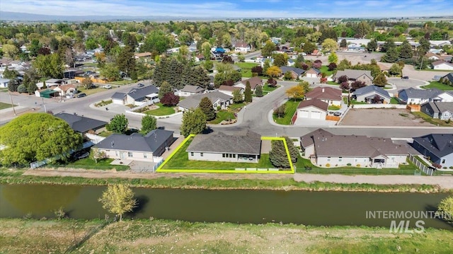 1441 Marie Dr, Gooding, ID 83330 - aerial view of residential area with property parcel outlined and a large body of water