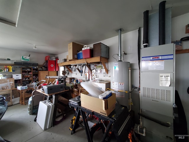 1441 Marie Dr, Gooding, ID 83330 - garage with gas water heater and heating unit