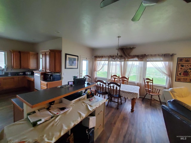 1441 Marie Dr, Gooding, ID 83330 - dining area with a chandelier, plenty of natural light, and dark wood-style flooring