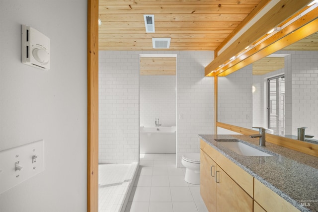 full bathroom featuring tile patterned flooring, wood ceiling, vanity, a freestanding bath, and toilet