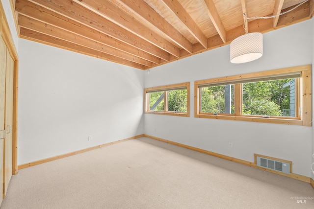 unfurnished room featuring carpet flooring and baseboards