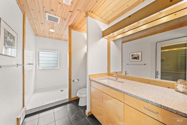 bathroom with tile patterned floors, toilet, vanity, wood ceiling, and a walk in shower