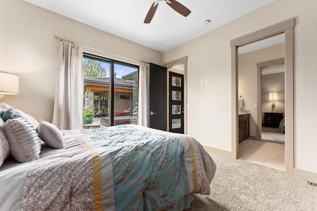 bedroom featuring light carpet, a ceiling fan, connected bathroom, and access to exterior