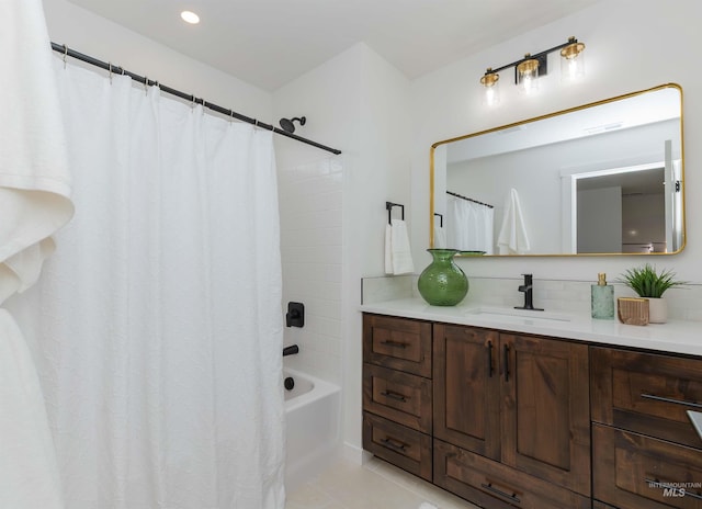 2117 Oxon St, Caldwell, ID 83605 - bathroom featuring vanity, decorative backsplash, tile patterned flooring, shower / tub combo, and recessed lighting