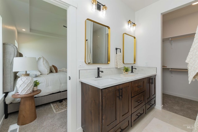 2117 Oxon St, Caldwell, ID 83605 - full bath with double vanity, tile patterned flooring, and connected bathroom