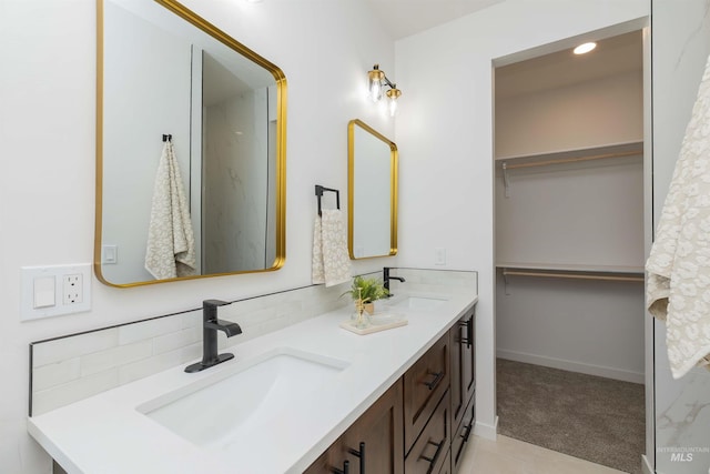 2117 Oxon St, Caldwell, ID 83605 - bathroom featuring double vanity and baseboards