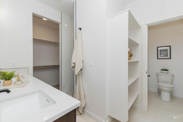 2117 Oxon St, Caldwell, ID 83605 - full bath with vanity and tile patterned flooring