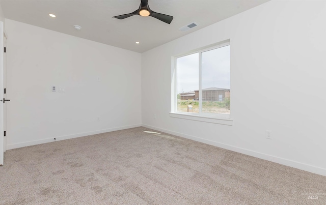 2117 Oxon St, Caldwell, ID 83605 - unfurnished room with carpet floors, ceiling fan, and recessed lighting