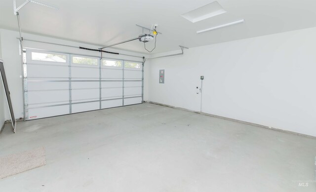 2117 Oxon St, Caldwell, ID 83605 - garage featuring a garage door opener and electric panel