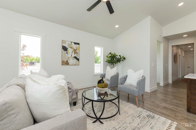 2117 Oxon St, Caldwell, ID 83605 - living room featuring vaulted ceiling, ceiling fan, recessed lighting, and light wood-type flooring