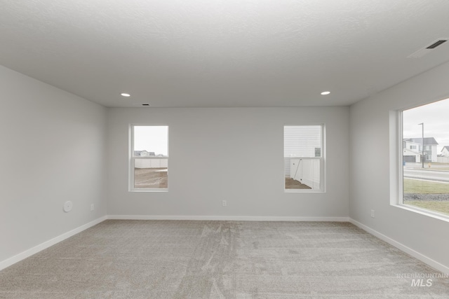 14761 N Ninja Way, Nampa, ID 83651 - spare room with recessed lighting, light colored carpet, and baseboards