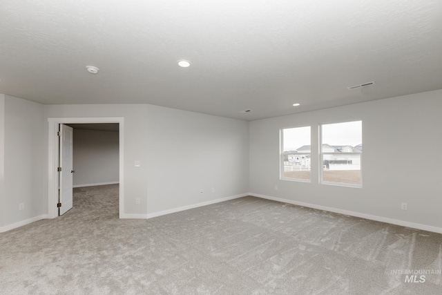 14761 N Ninja Way, Nampa, ID 83651 - spare room with recessed lighting, baseboards, light colored carpet, and a textured ceiling