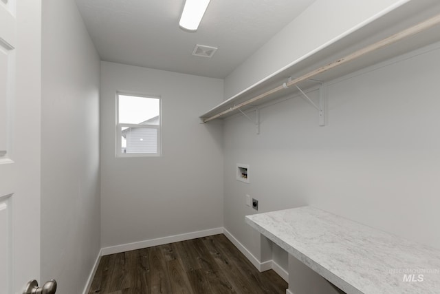 14761 N Ninja Way, Nampa, ID 83651 - clothes washing area with visible vents, dark wood-type flooring, washer hookup, laundry area, and hookup for an electric dryer