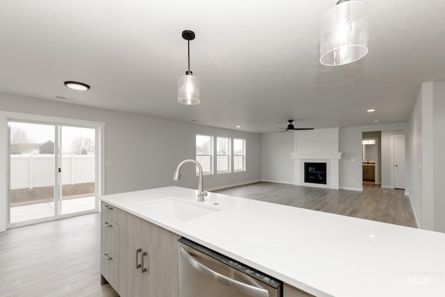 14761 N Ninja Way, Nampa, ID 83651 - kitchen with stainless steel dishwasher, pendant lighting, a healthy amount of sunlight, and a sink