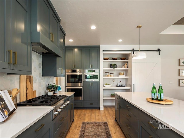 kitchen with stainless steel appliances, light countertops, open shelves, light wood-style flooring, and tasteful backsplash