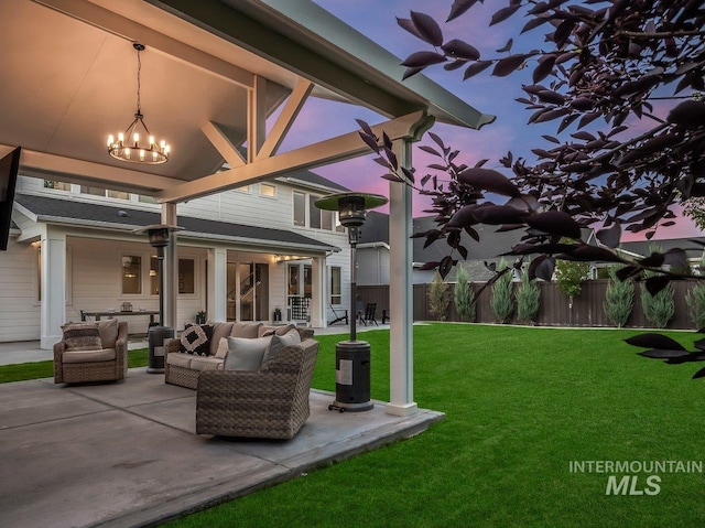 view of patio / terrace featuring an outdoor living space and fence