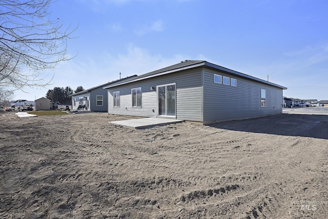 rear view of property with a patio area