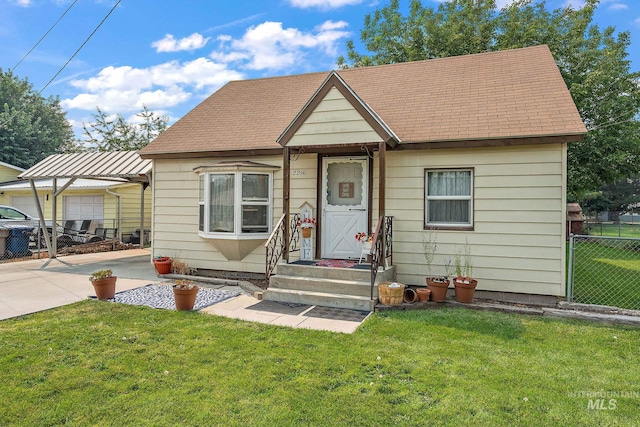 bungalow-style house featuring a front yard