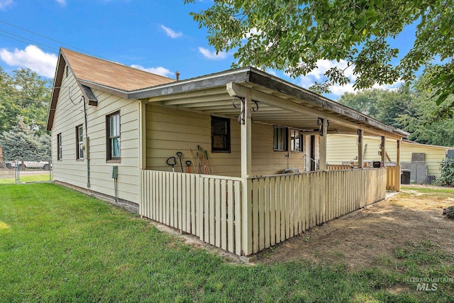 exterior space featuring a lawn