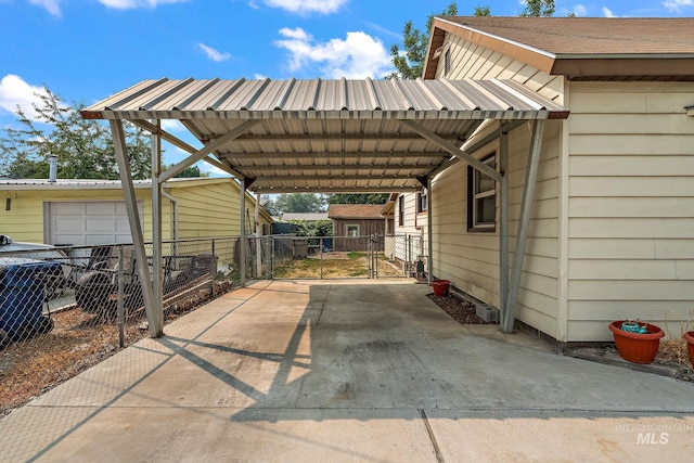 view of parking / parking lot featuring a garage and a carport