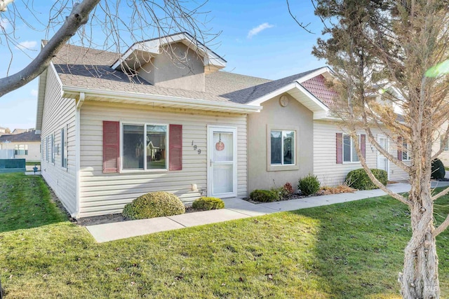 view of front of home with a front yard