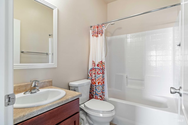 full bathroom with vanity, toilet, and shower / tub combo