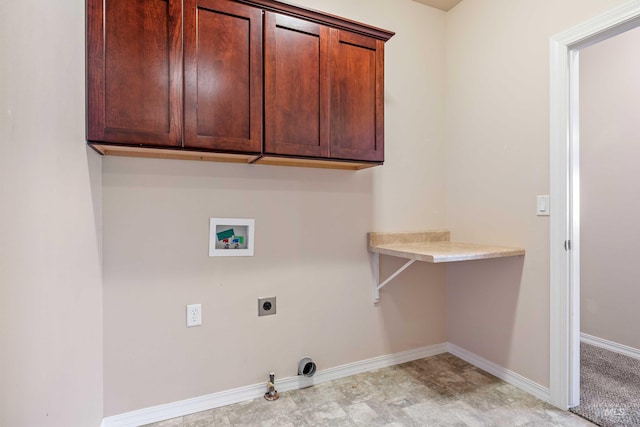 laundry area with hookup for a gas dryer, hookup for a washing machine, cabinets, and hookup for an electric dryer