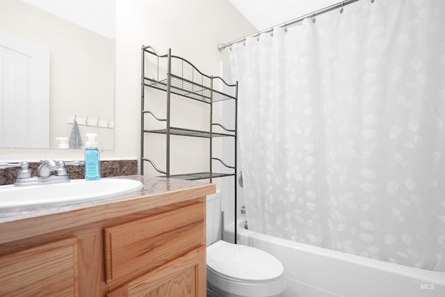 full bathroom featuring vanity, shower / bath combination with curtain, and toilet